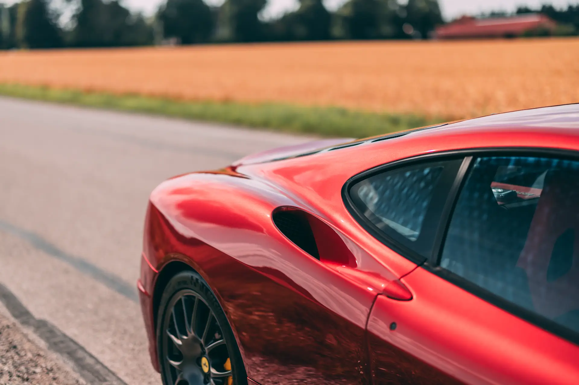 Ferrari-ChallengeStradale-2003-rossofiorano-sidedetail