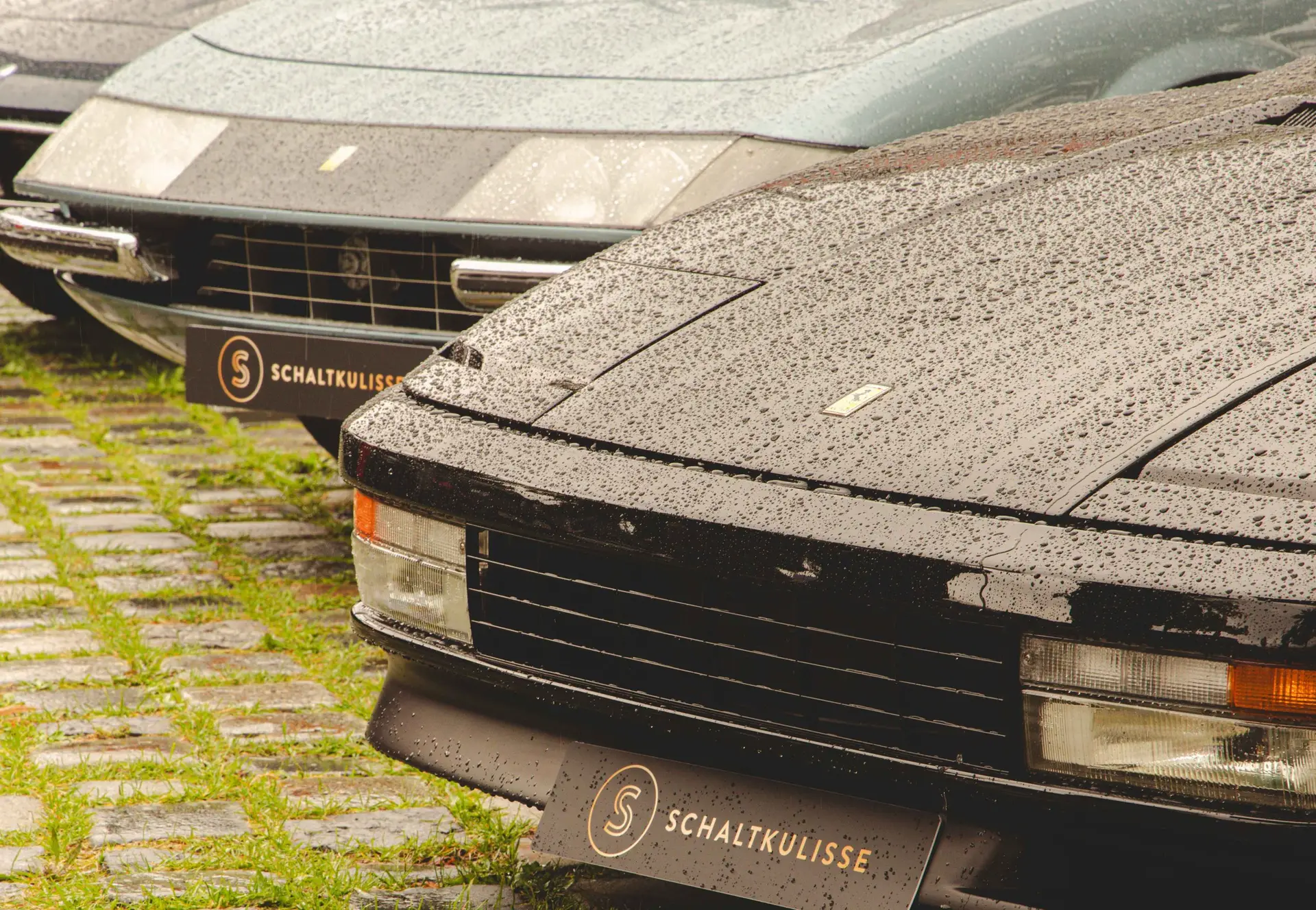Ferrari Testarossa and Ferrari Daytona displayed at the Concours of Elegance at Tegernsee