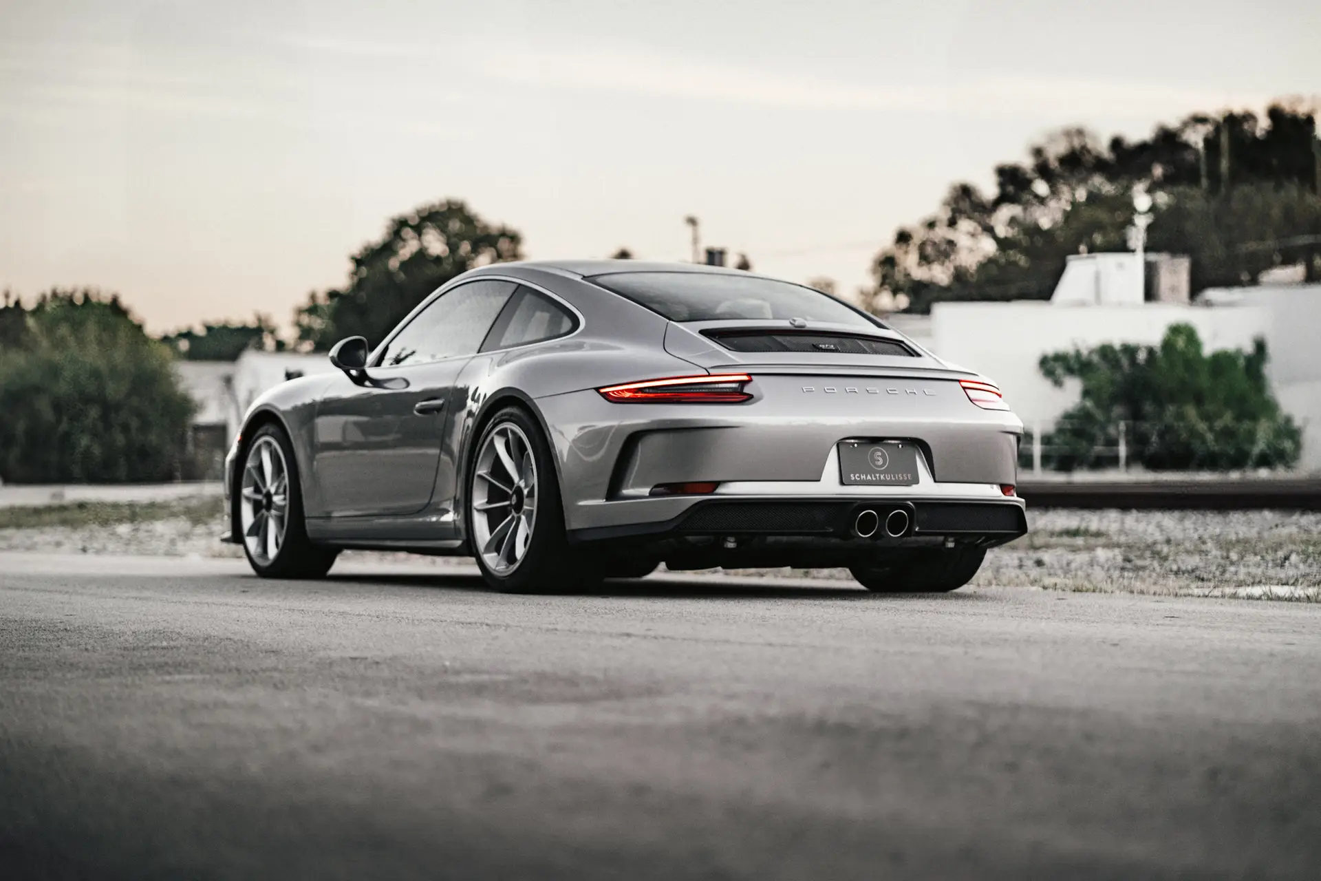 Porsche-991GT3Touring-2019-gtsilver-rearleftlow